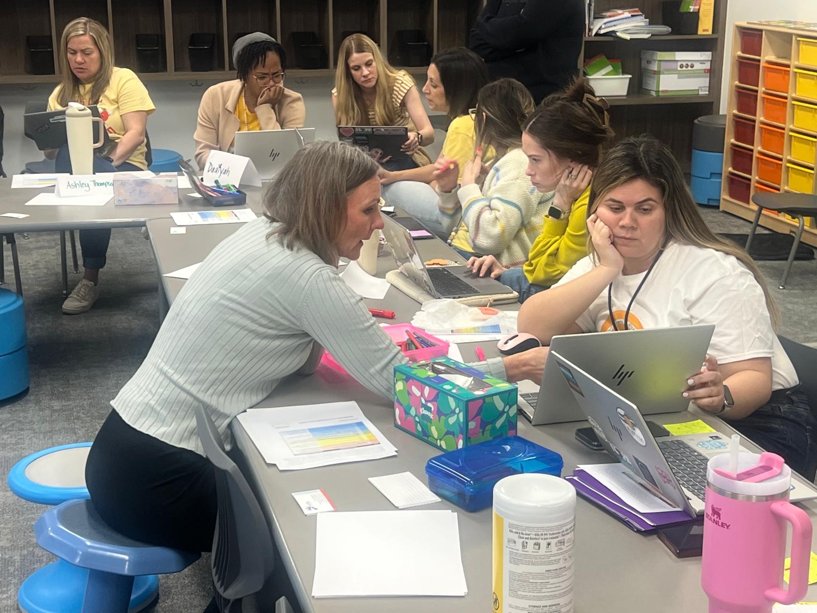 Educators working together during a professional development workshop.